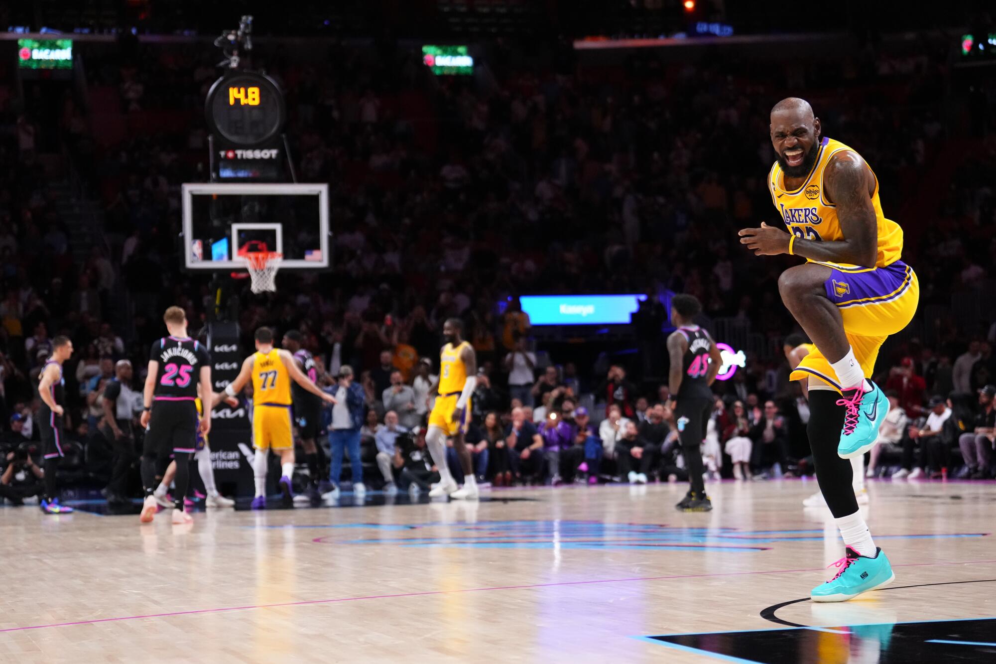 Lakers star LeBron James reacts to a free throw by teammate Luka Doncic in the fourth quarter.