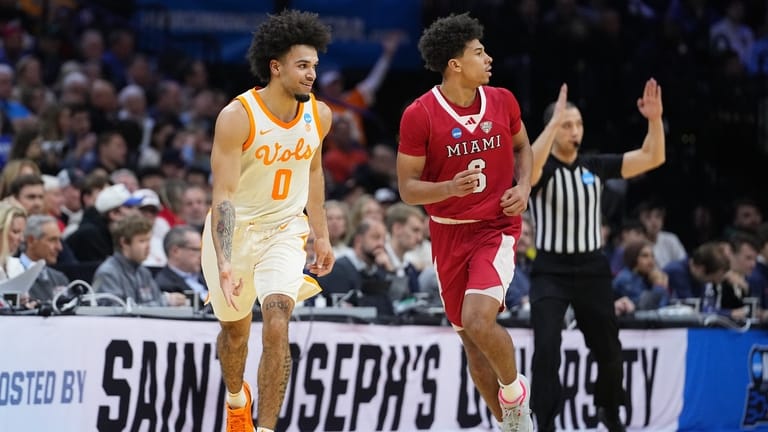 Tennessee's Ja'kobi Gillespie (0) reacts past Miami (Ohio)'s Justin Kirby...