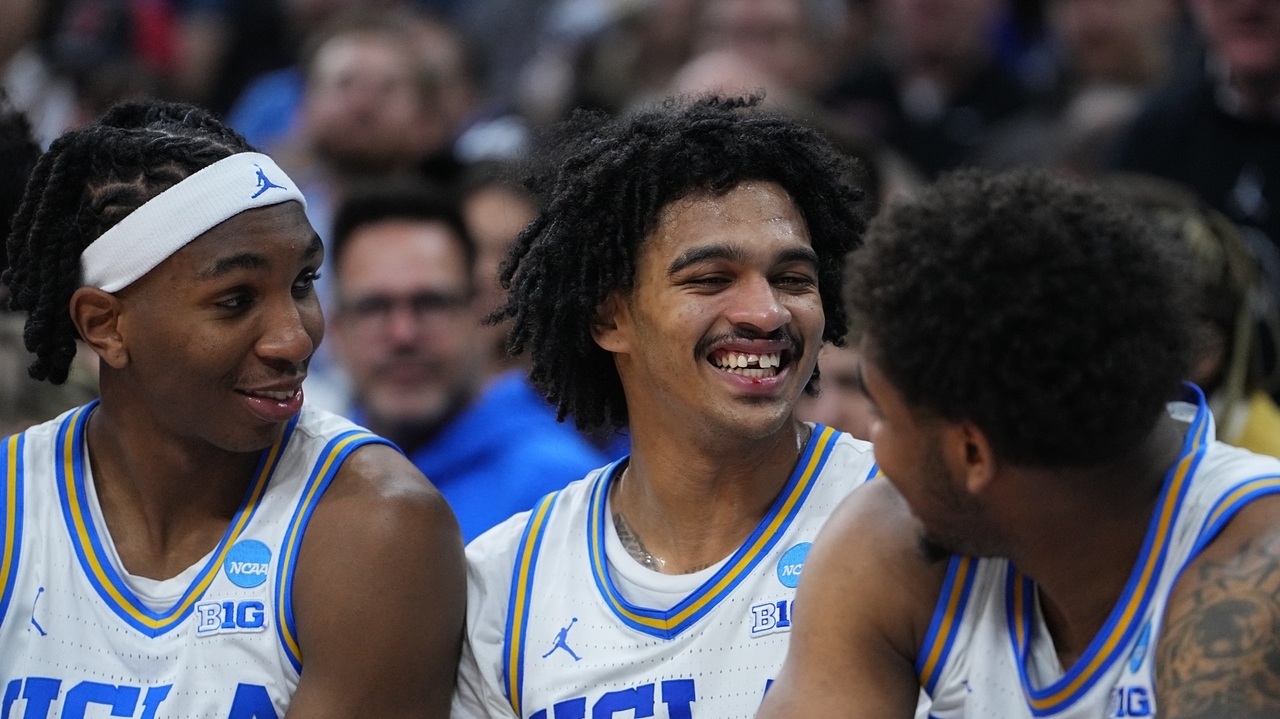 Mouth madness! UCLA's Skyy Clark grins and bears it after tooth bites the dust in NCAA Tournament