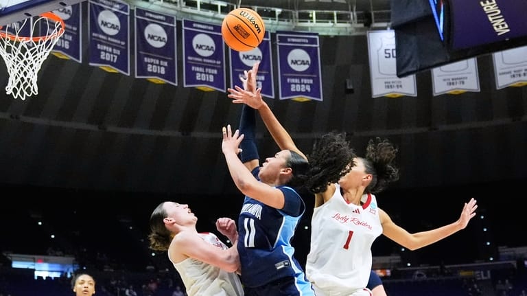 Villanova guard Jasmine Bascoe (11) shoots between Texas Tech guard...