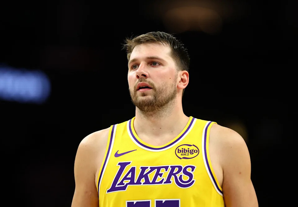 Los Angeles Lakers guard Luka Doncic (77) looks on during a game.Mark J. Rebilas-Imagn Images
