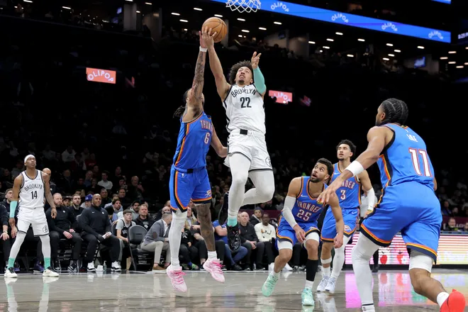 Mar 18, 2026; Brooklyn, New York, USA; Brooklyn Nets forward Jalen Wilson (22) drives to the basket against Oklahoma City Thunder forward Jaylin Williams (6) and guards Ajay Mitchell (25) and Jared McCain (3) during the third quarter at Barclays Center. Mandatory Credit: Brad Penner-Imagn Images