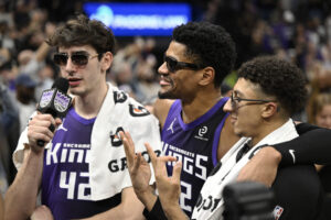 SACRAMENTO, CALIFORNIA - JANUARY 16: Maxime Raynaud #42 of the Sacramento Kings, Dylan Cardwell #32, and Nique Clifford #5 stand on the court after the game against the Washington Wizards at Golden 1 Center on January 16, 2026 in Sacramento, California. NOTE TO USER: User expressly acknowledges and agrees that, by downloading and or using this photograph, User is consenting to the terms and conditions of the Getty Images License Agreement. (Photo by Eakin Howard/Getty Images)