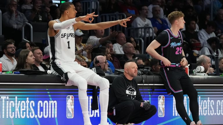 San Antonio Spurs forward Victor Wembanyama (1) reacts during the...