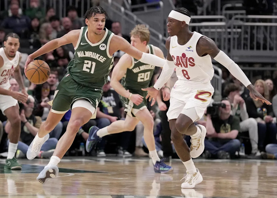 Bucks forward Ousmane Dieng drives against Cavaliers guard Dennis Schroder during their game March 17 at Fiserv Forum.