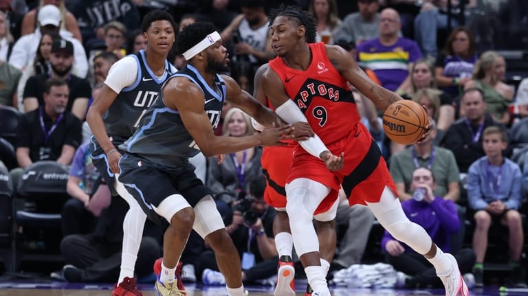 Toronto Raptors forward RJ Barrett (9) moves the ball as...