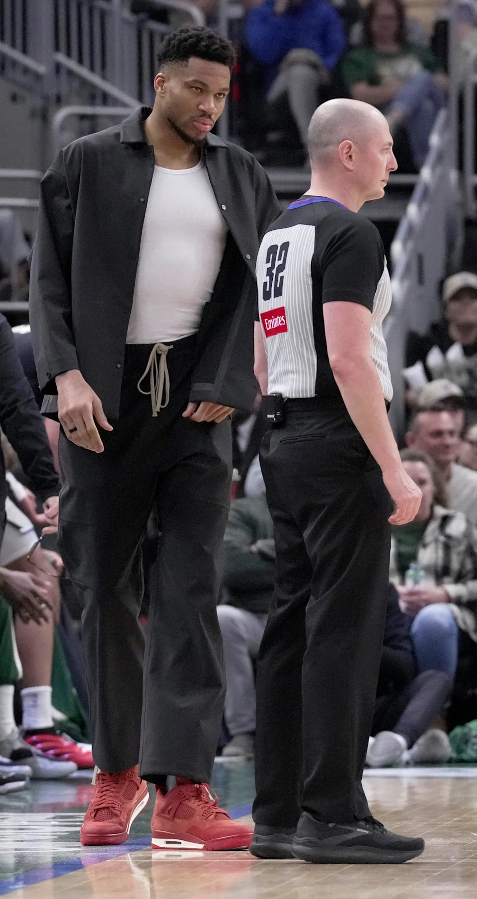 Milwaukee Bucks forward Giannis Antetokounmpo talks with referee Marat Kogut (32) during the second half of their game Sunday, March 8, 2026 at Fiserv Forum in Milwaukee, Wisconsin. The Orlando Magic beat the Milwaukee Bucks 130-91.