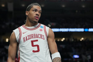 PORTLAND, OREGON - MARCH 21: Darius Acuff Jr. #5 of the Arkansas Razorbacks looks on against the High Point Panthers during the second half in the second round of the 2026 NCAA Men's Basketball Tournament at Moda Center on March 21, 2026 in Portland, Oregon. (Photo by Soobum Im/Getty Images)
