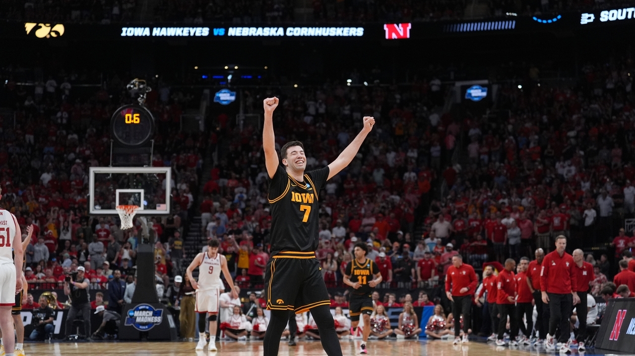 Ninth-seeded Iowa continues improbable March run, beating Nebraska 77-71 to reach Sweet 16
