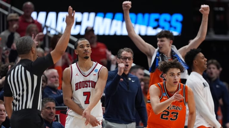 Illinois guard Keaton Wagler (23) reacts to a score alongside...