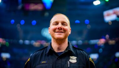 Chris Porter, a 42-year-old Cleveland police officer, works his post during a Cavaliers game against the Miami Heat at Rocket Arena.