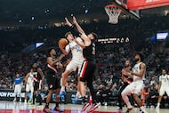 Dallas Mavericks forward Cooper Flagg (32) goes to the basket against Portland Trail Blazers...