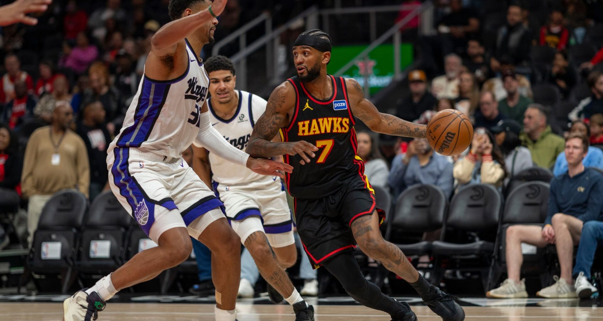 Hawks withstand fourth-quarter surge by Kings in 123-113 victory as Snyder gets 500th win