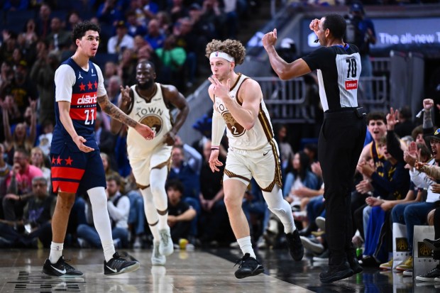 Golden State Warriors guard Brandin Podziemski (2) celebrates after making a 3-point basket in the fourth quarter of their NBA game at Chase Center in San Francisco, Calif., on Friday, March 27, 2026. The Golden State Warriors defeated the Washington Wizards 131-126. (Jose Carlos Fajardo/Bay Area News Group)