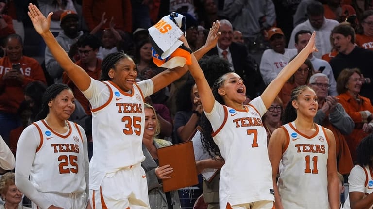 Texas' Breya Cunningham (25), Madison Booker (35), Jordan Lee (7)...