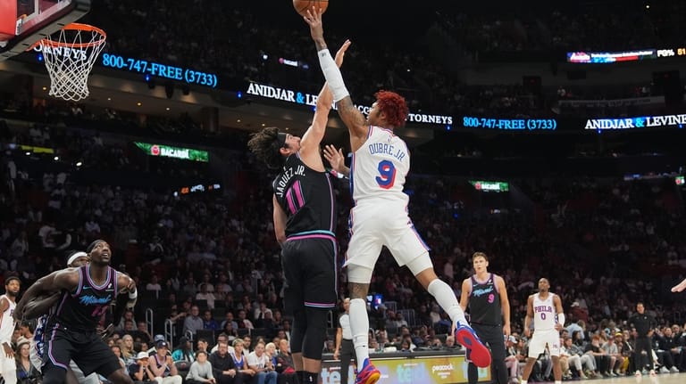 Philadelphia 76ers guard Kelly Oubre Jr. (9) shoots as Miami...