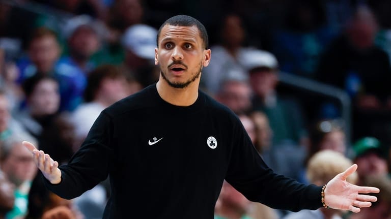 Boston Celtics head coach Joe Mazzulla reacts during the second...