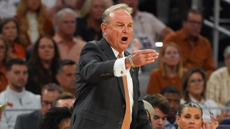Texas head coach Vic Schaefer watches against Michigan during the...