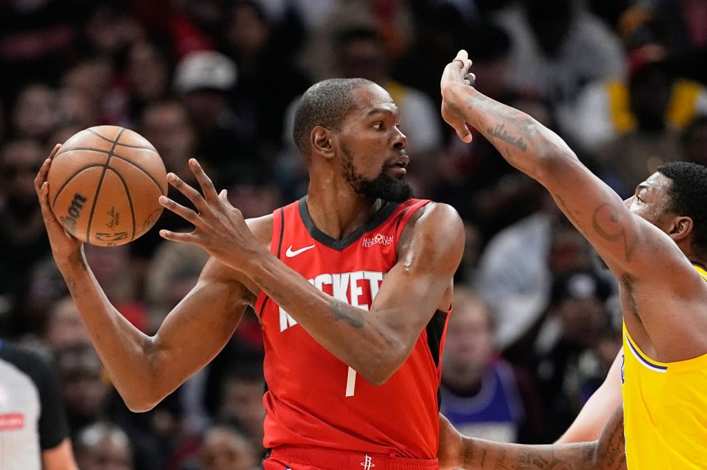 Houston Rockets’ Kevin Durant is defended by Los Angeles Lakers’ Marcus Smart. AP