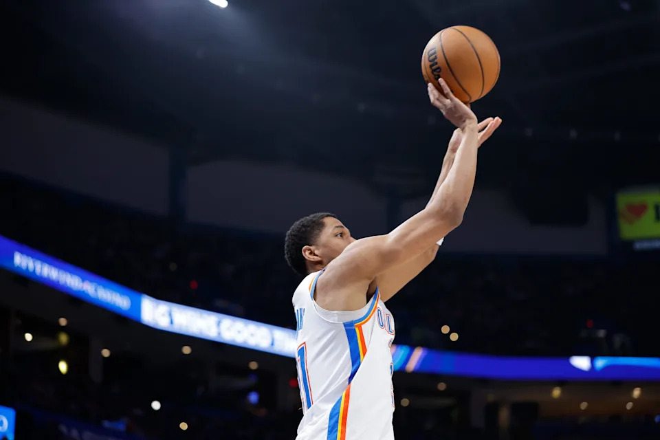 Mar 30, 2026; Oklahoma City, Oklahoma, USA; Oklahoma City Thunder guard Aaron Wiggins (21) shoots a three point basket against the Detroit Pistons during the second half at Paycom Center. Mandatory Credit: Alonzo Adams-Imagn Images