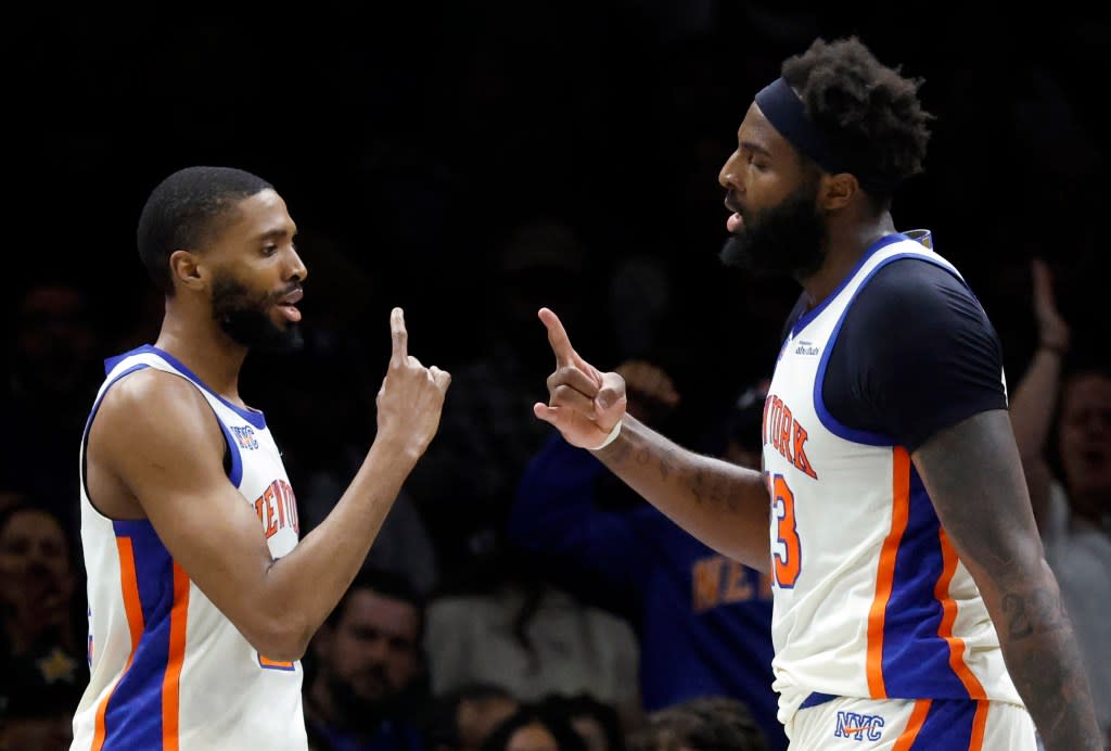 New York Knicks guard Mikal Bridges (L) and teammate New York Knicks center Mitchell Robinson reacts during their teams game against the Brooklyn Nets during the first half at the Barclays Center in New York, New York, USA, Friday, March 20, 2026. JASON SZENES FOR THE NEW YORK POST