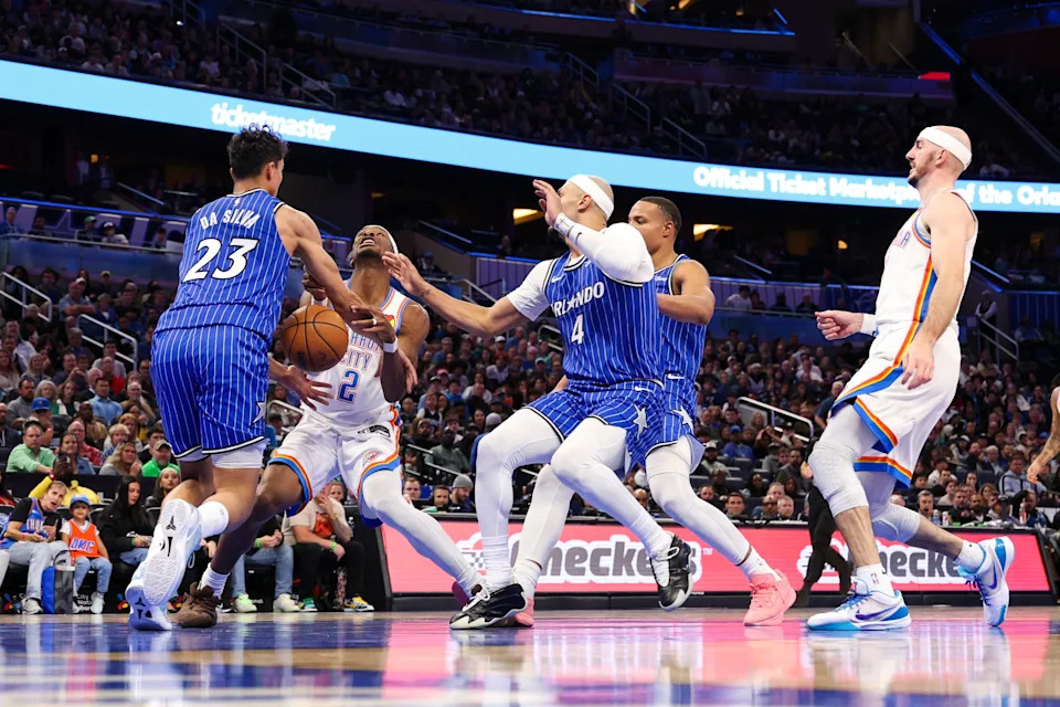 Mar 17, 2026; Orlando, Florida, USA; Orlando Magic forward Tristan da Silva (23) strips the ball from Oklahoma City Thunder guard Shai Gilgeous-Alexander (2) in the fourth quarter at Kia Center. Mandatory Credit: Nathan Ray Seebeck-Imagn Images