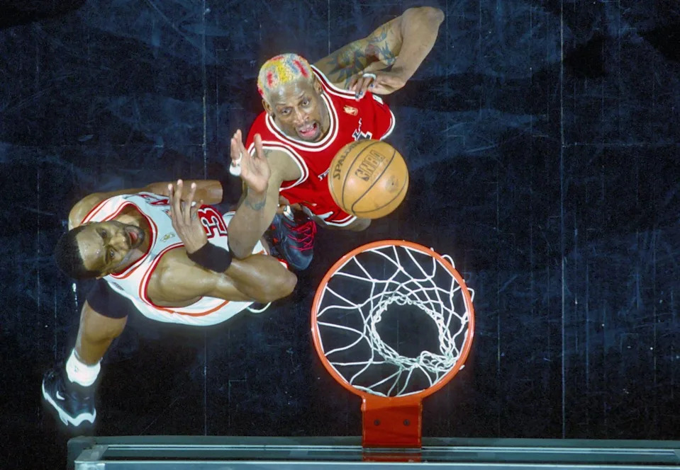 Chicago Bulls forward #91 DENNIS RODMAN looks to rebound against Miami Heat center ALONZO MOURNING at the Miami Arena during the 1996-97 season. USA TODAY Sports (c) Copyright USA TODAY Sports