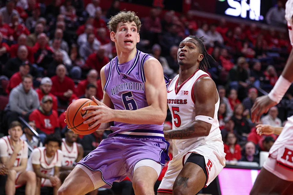 Feb 24, 2026; Piscataway, New Jersey, USA; Washington Huskies forward Hannes Steinbach (6) looks to the basket as Rutgers Scarlet Knights guard Darren Buchanan Jr. (5) defends during the first half at Jersey Mike's Arena. Mandatory Credit: Vincent Carchietta-Imagn Images