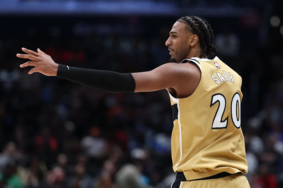 WASHINGTON, DC - MARCH 21: Alex Sarr #20 of the Washington Wizards celebrates after scoring a three-pointer against the Oklahoma City Thunder during the second half at Capital One Arena on March 21, 2026 in Washington, DC. NOTE TO USER: User expressly acknowledges and agrees that, by downloading and or using this photograph, User is consenting to the terms and conditions of the Getty Images License Agreement. (Photo by Patrick Smith/Getty Images)