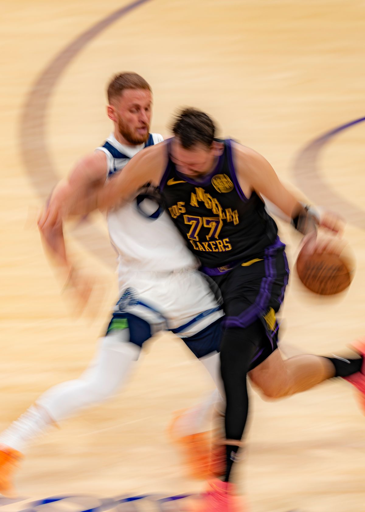 Los Angeles Lakers guard Luka Doncic (77) pushing through Timberwolves defense during an NBA basketball game against the Minnesota Timberwolves on March 10th, 2026 in Los Angeles, CA. Los Angeles Lakers guard Luka Doncic (77) pushing through Timberwolves defense during an NBA basketball game against the Minnesota Timberwolves on March 10th, 2026 in Los Angeles, CA.