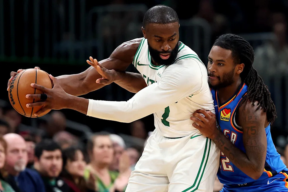 BOSTON, MASSACHUSETTS - MARCH 25: Cason Wallace #22 of the Oklahoma City Thunder defends Jaylen Brown #7 of the Boston Celtics during the second half at TD Garden on March 25, 2026 in Boston, Massachusetts. The Celtics defeat the Thunder 119-109. NOTE TO USER: User expressly acknowledges and agrees that, by downloading and/or using this Photograph, user is consenting to the terms and conditions of the Getty Images License Agreement. (Photo by Maddie Meyer/Getty Images)