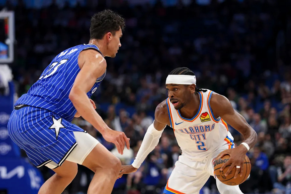 Mar 17, 2026; Orlando, Florida, USA; Oklahoma City Thunder guard Shai Gilgeous-Alexander (2) is guarded by Orlando Magic forward Tristan da Silva (23) in the third quarter at Kia Center. Mandatory Credit: Nathan Ray Seebeck-Imagn Images