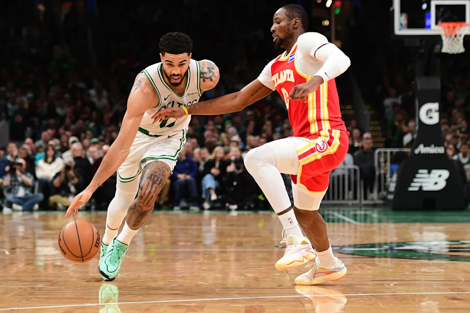 Mar 27, 2026; Boston, Massachusetts, USA; Boston Celtics forward Jayson Tatum (0) drives against Atlanta Hawks forward Jonathan Kuminga (0) during the second half at TD Garden. Mandatory Credit: Bob DeChiara-Imagn Images