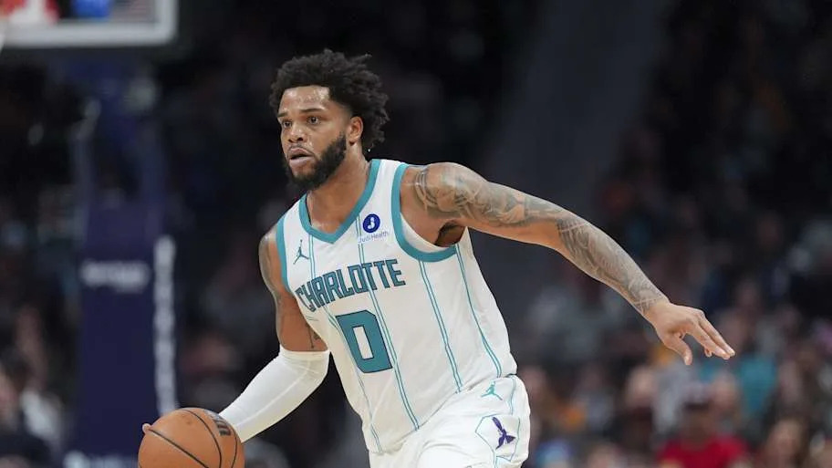 Charlotte Hornets forward Miles Bridges brings the ball up court against the Sacramento Kings