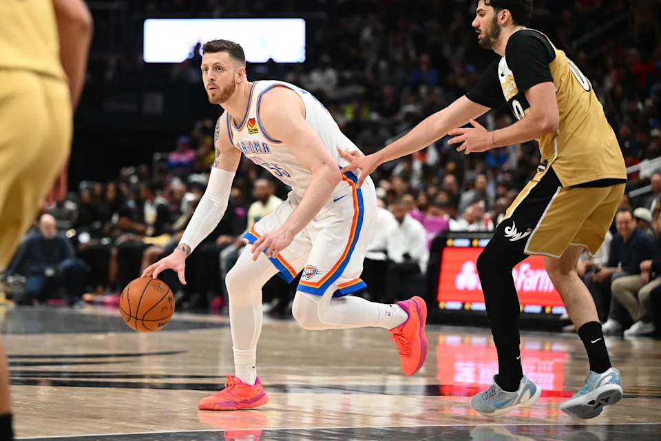 Mar 21, 2026; Washington, District of Columbia, USA; Oklahoma City Thunder center/forward Isaiah Hartenstein (55) dribbles as Washington Wizards forward Tristan Vukcevic (00) defends during the second half at Capital One Arena. Mandatory Credit: Brad Mills-Imagn Images
