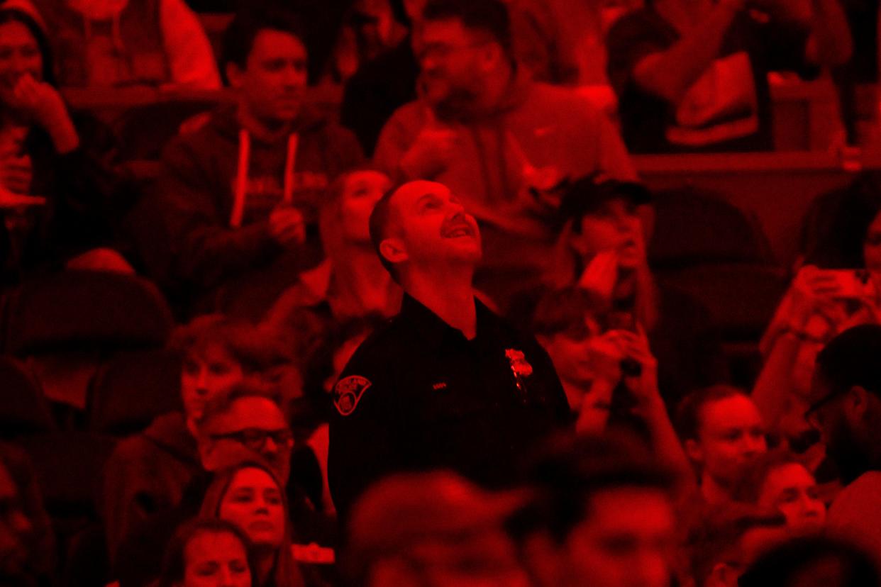Chris Porter, a 42-year-old Cleveland police officer, works his post during the Cavaliers game against the Miami Heat on March 25.