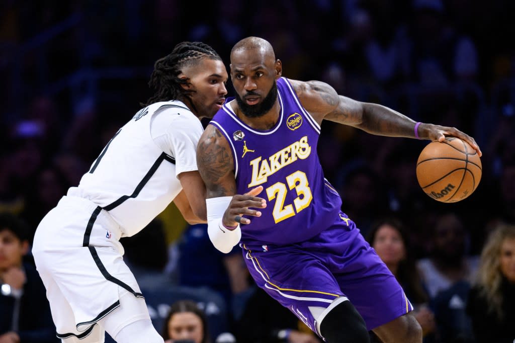 Nets forward Ziaire Williams (1) defends the Lakers’ LeBron James (23) on March 27, 2026. IMAGN IMAGES via Reuters Connect