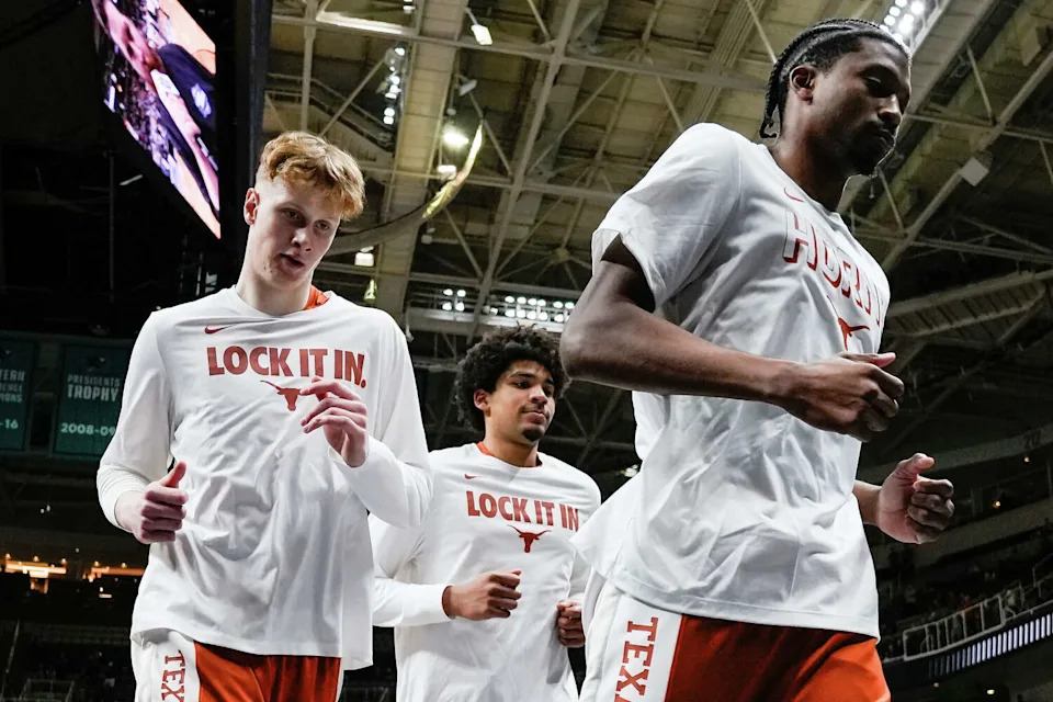 Texas Longhorns center Matas Vokietaitis (8), forward John Clark (9) and guard Tramon Mark (12) head to the locker room after warm-ups ahead of Texas’ 79-77 loss to the Purdue Boilermakers in the Sweet 16 round of the NCAA Basketball Tournament at the SAP Center in San Jose, California, March 26, 2026. (Sara Diggins/Austin American-Statesman)