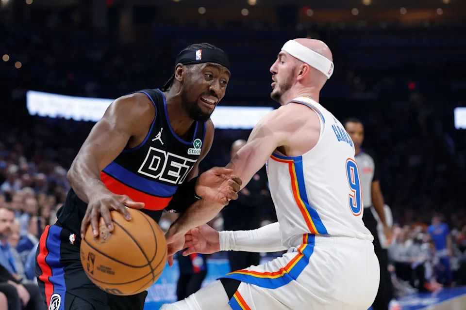 Mar 30, 2026; Oklahoma City, Oklahoma, USA; Detroit Pistons guard Caris LeVert (8) drives around Oklahoma City Thunder guard Alex Caruso (9) during the first half at Paycom Center. Mandatory Credit: Alonzo Adams-Imagn Images