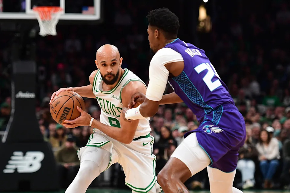 Mar 4, 2026; Boston, Massachusetts, USA; Charlotte Hornets forward Brandon Miller (24) defends Boston Celtics guard Derrick White (9) during the first half at TD Garden. Mandatory Credit: Bob DeChiara-Imagn Images