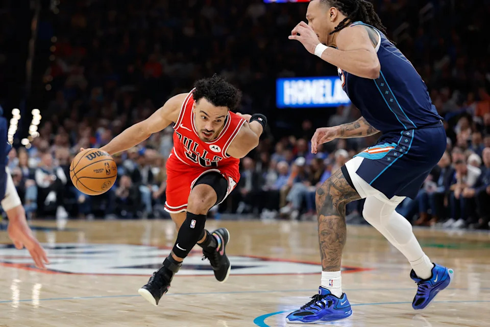 Mar 27, 2026; Oklahoma City, Oklahoma, USA; Chicago Bulls guard Tre Jones (30) drives past Oklahoma City Thunder forward Jaylin Williams (6) during the second half at Paycom Center. Mandatory Credit: Alonzo Adams-Imagn Images