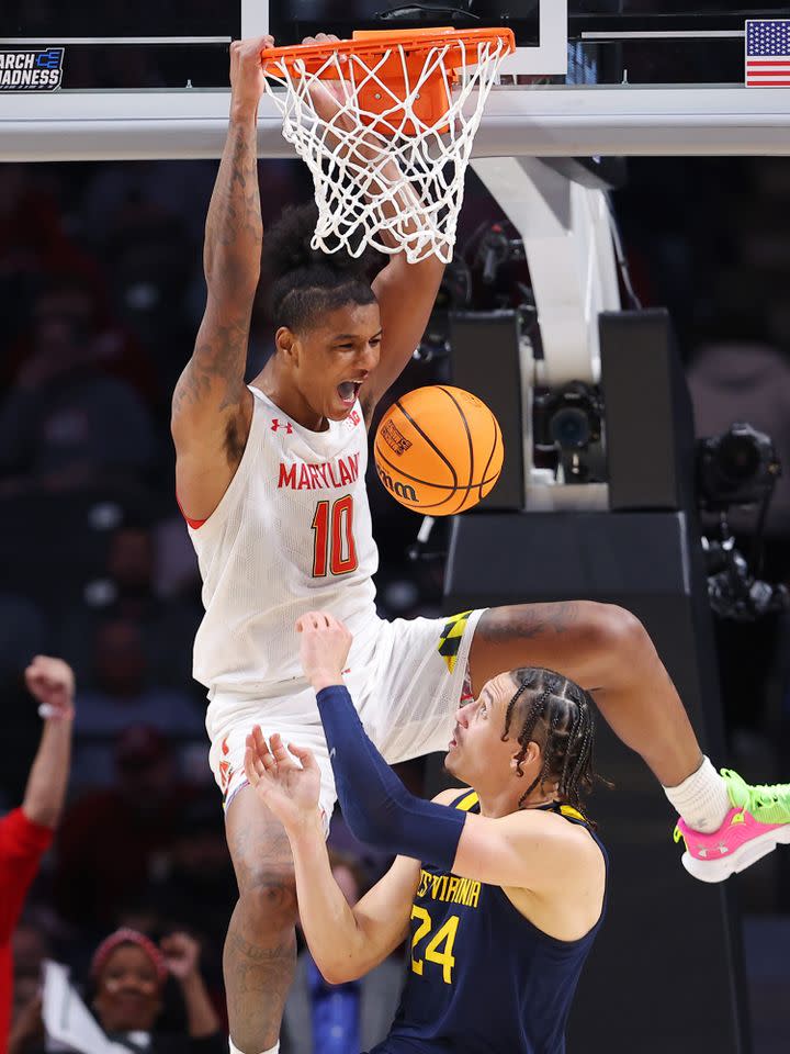 Julian Reese dunks the ball against Patrick Suemnick of the West Virginia Mountaineers during the second half in the first round of the NCAA Men's Basketball Tournament on March 16, 2023 in Birmingham, Alabama.Credit: Kevin C. Cox/Getty