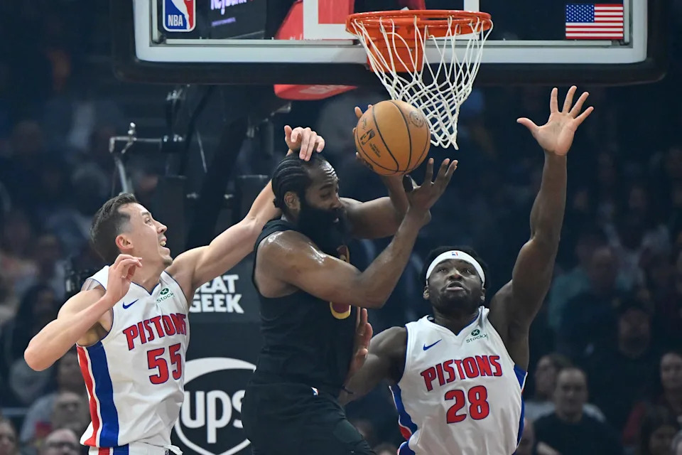 Detroit Pistons forward Duncan Robinson (55) and forward Isaiah Stewart (28) defend a pass by Cleveland Cavaliers guard James Harden (1) in the first quarter at Rocket Arena in Cleveland on Tuesday, March 3, 2026.
