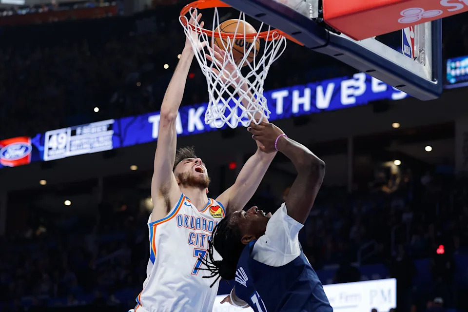Mar 15, 2026; Oklahoma City, Oklahoma, USA; Oklahoma City Thunder center/forward Chet Holmgren (7) is fouled by Minnesota Timberwolves center/forward Naz Reid (11) on the way to the basket during the first half at Paycom Center. Mandatory Credit: Alonzo Adams-Imagn Images