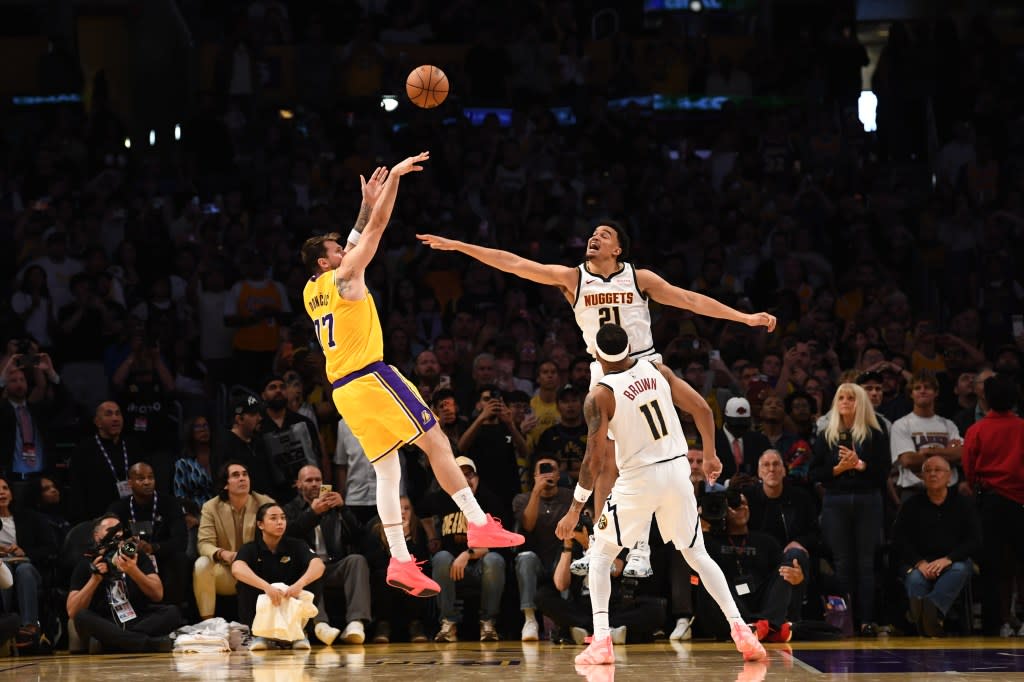 Lakers’ Luka Dončić shoots the game-winning against the Denver Nuggets on March 14 at Crypto.com Arena in LA. NBAE via Getty Images