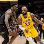 Los Angeles Lakers forward LeBron James (23) dribbles against New Orleans Pelicans forward Zion Williamson (1) during the first half at Smoothie King Center on Jan 6, 2026.