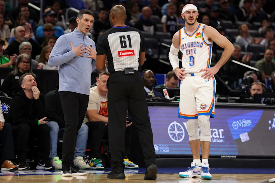 Mar 17, 2026; Orlando, Florida, USA; Oklahoma City Thunder head coach Mark Daigneault talks to referee Courtney Kirkland (61) after a foul by guard Alex Caruso (9) against the Orlando Magic in the second quarter at Kia Center. Mandatory Credit: Nathan Ray Seebeck-Imagn Images