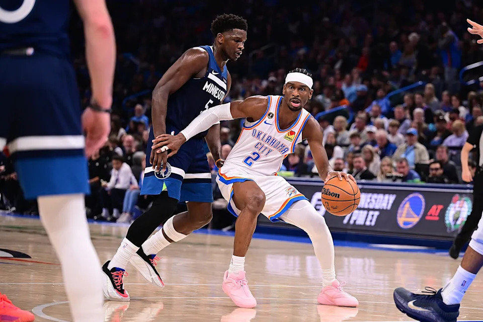 OKLAHOMA CITY, OKLAHOMA - MARCH 15: Shai Gilgeous-Alexander #2 of the Oklahoma City Thunder handles the ball in front of Anthony Edwards #5 of the Minnesota Timberwolves during the second half at Paycom Center on March 15, 2026 in Oklahoma City, Oklahoma. NOTE TO USER: User expressly acknowledges and agrees that, by downloading and or using this photograph, User is consenting to the terms and conditions of the Getty Images License Agreement. (Photo by Joshua Gateley/Getty Images)