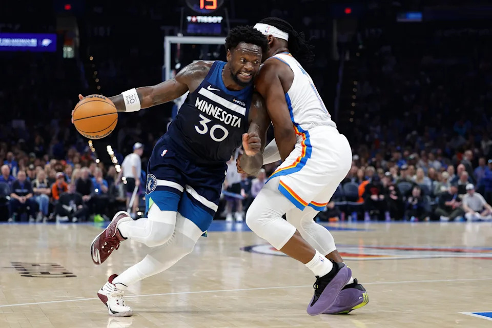 Mar 15, 2026; Oklahoma City, Oklahoma, USA; Minnesota Timberwolves forward/center Julius Randle (30) drives past Oklahoma City Thunder guard Luguentz Dort (5) during the second half at Paycom Center. Mandatory Credit: Alonzo Adams-Imagn Images