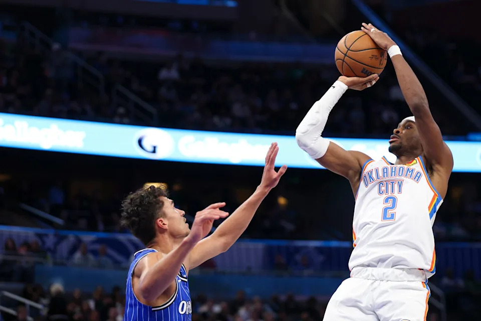 Mar 17, 2026; Orlando, Florida, USA; Oklahoma City Thunder guard Shai Gilgeous-Alexander (2) shoots the ball over Orlando Magic forward Tristan da Silva (23) in the third quarter at Kia Center. Mandatory Credit: Nathan Ray Seebeck-Imagn Images